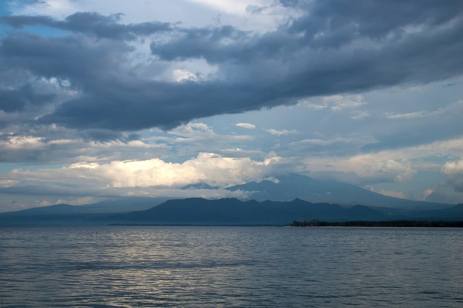 Lombok Island and Mount Rinjani under clouds, Gili Islands, Indonesia